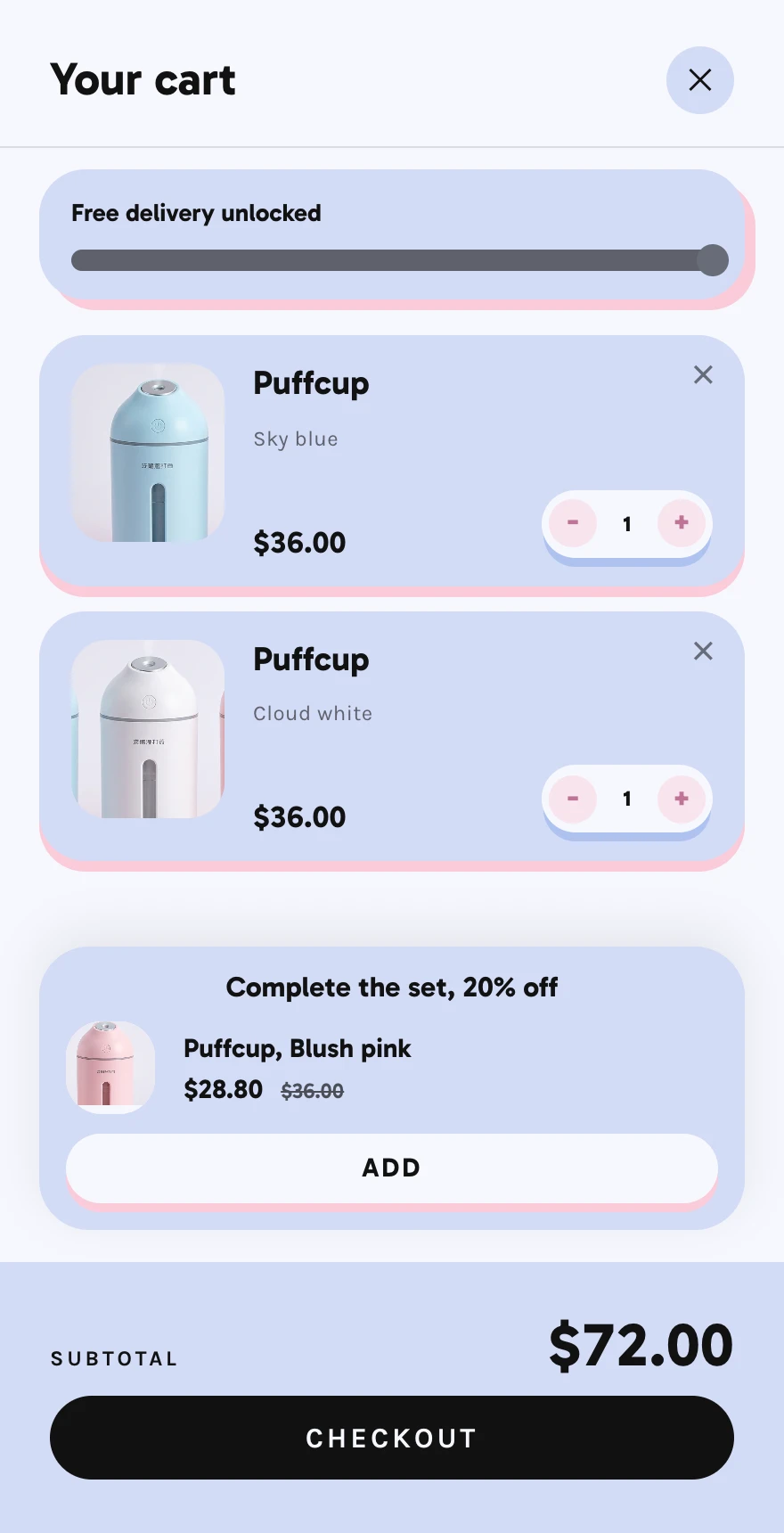 Puffcup's cart with a blue and a white humidifier, free delivery unlocked, and one offer: complete the set, 20% off, a pink Puffcup at $28.80 instead of $36.00